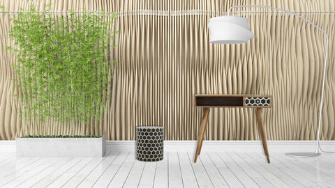 Modern wooden occasional stool with bone inlay and black and white geometric patterned drawer front