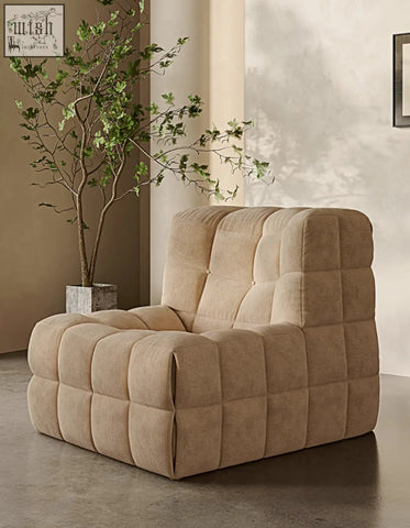 Beige corduroy bongani lounge chair with quilted blocky design perfect for living room lounge armchairs and chairs