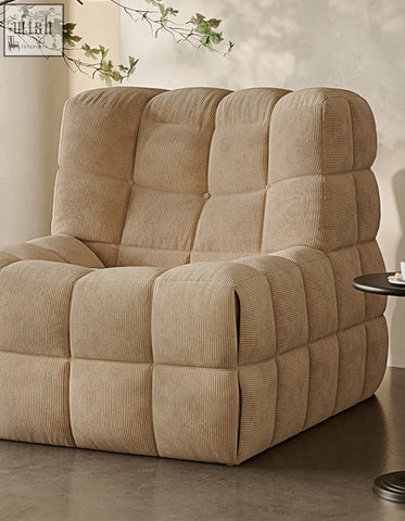 Beige corduroy bongani lounge chair with quilted segmented design perfect for stylish living room lounge armchairs