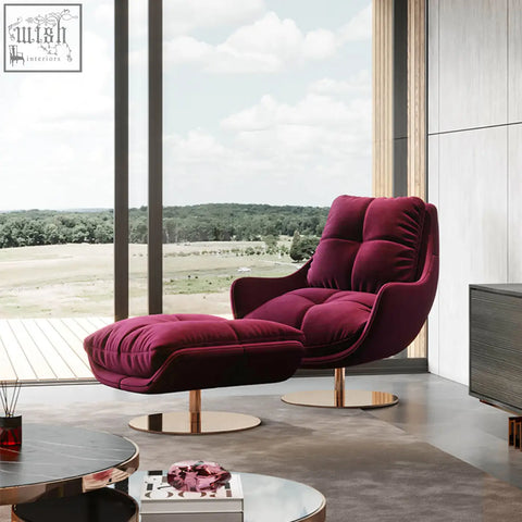 Deep burgundy velvet bonnet swivel lounge chair with matching ottoman on gold-toned swivel metal bases