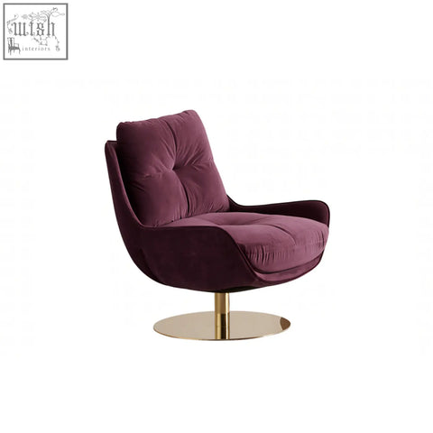 A plush deep purple velvet bonnet swivel lounge chair with a sleek gold-toned base and ottoman for comfort