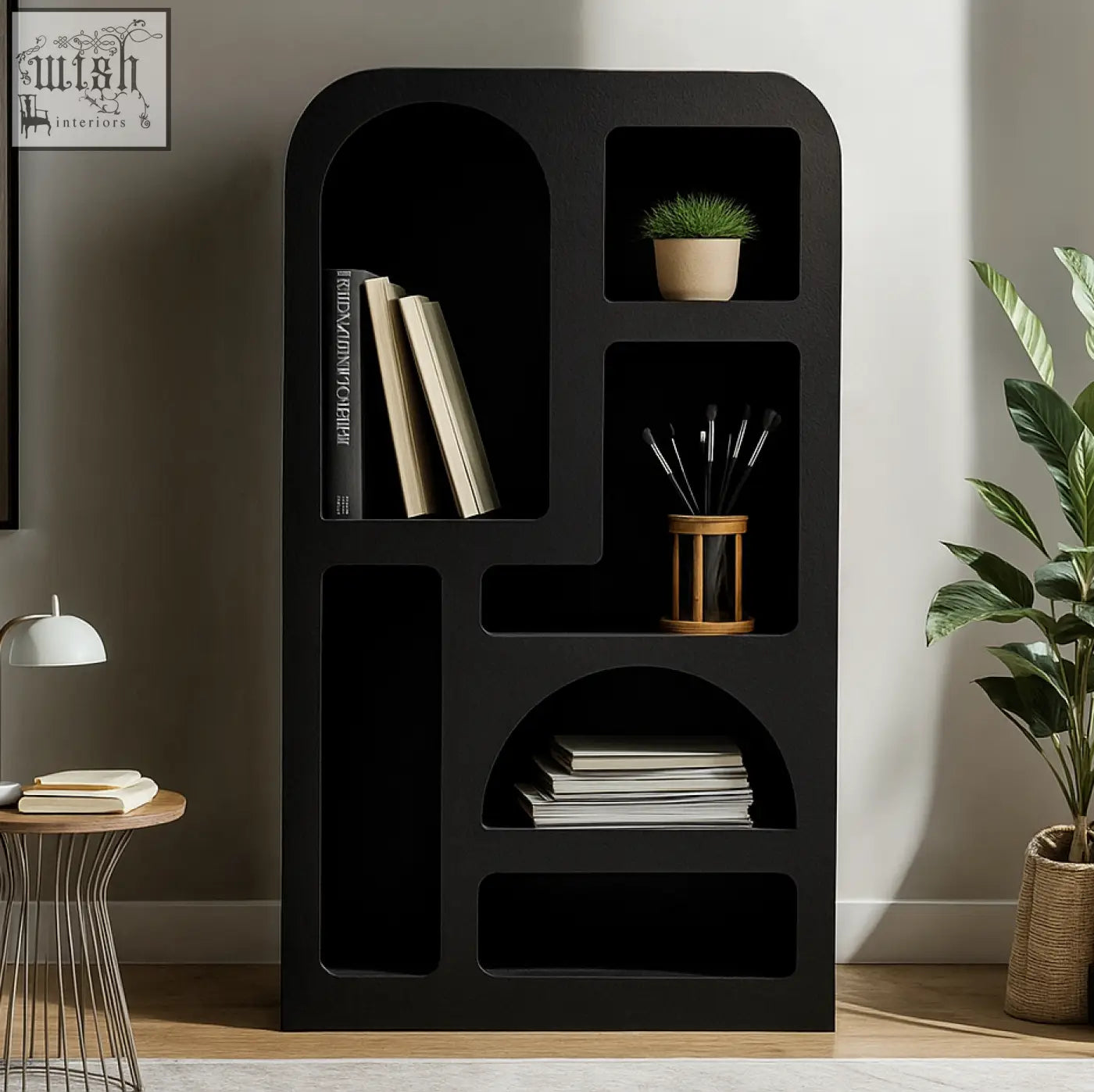 Black modern tall geometric bookcase otis large with matte black finish holding books potted plant and art supplies