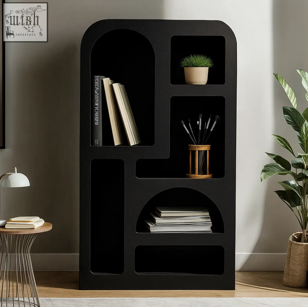 Black modern tall geometric bookcase otis large with matte black finish holding books potted plant and art supplies