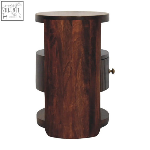 Dark wood bordeaux bedside table with vertical grooves drawer and brass knob made from natural mango wood