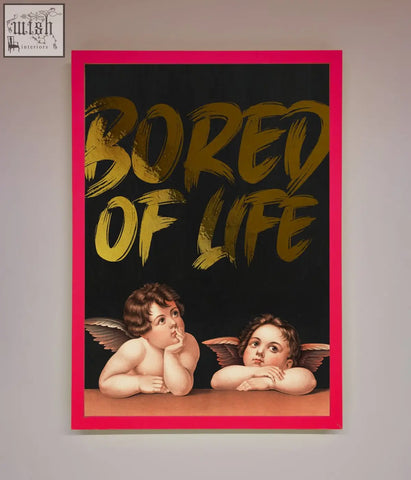 A vibrant pink-framed life foil print with bold gold lettering and classical cherubs on a black background