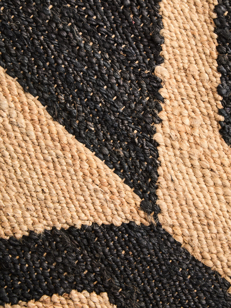 Bosie hemp large rug with black and beige geometric pattern woven from natural hemp fibers for stylish floor decor