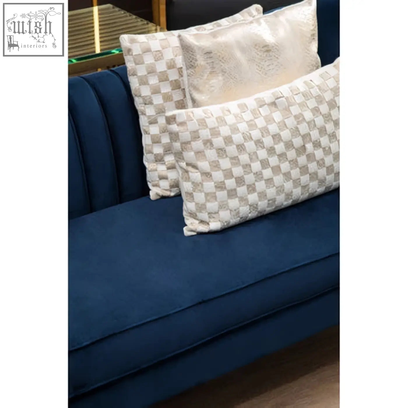 Deep blue velvet sofa with bosie kensington townhouse cream and gold check cushion in cream gold cushion colors