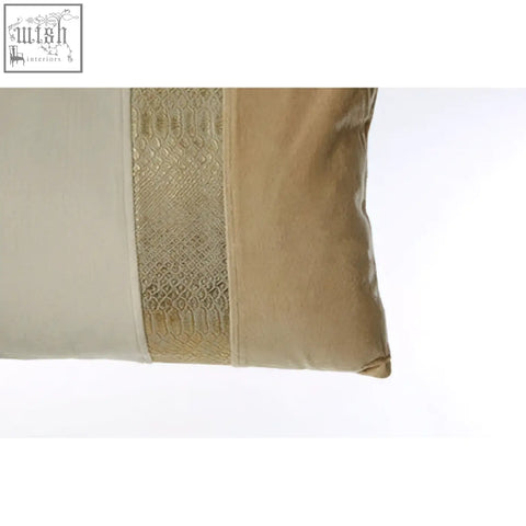 Beige bosie kensington townhouse rectangular cushion with a gold embroidered band and gold rectangular accents