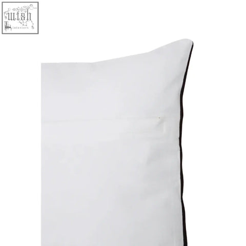 White pillow with black trim edge from bosie ozella black and white semi circular design cushion collection