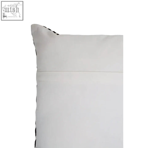 White square embroidered cushion with subtle seam and black and white striped trim bosie ozella black design