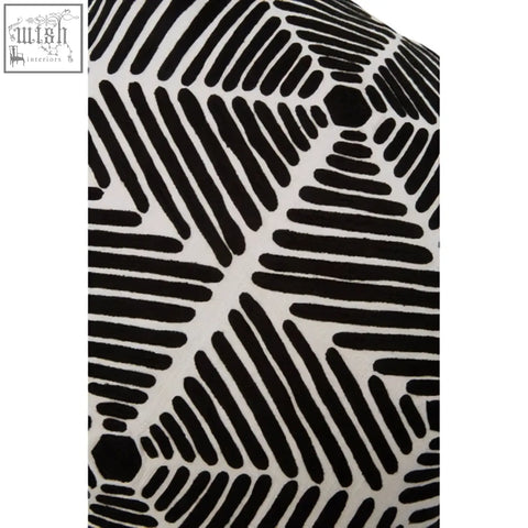 Bosie ozella black and white square embroidered cushion featuring bold geometric starburst lines in black and white fabric