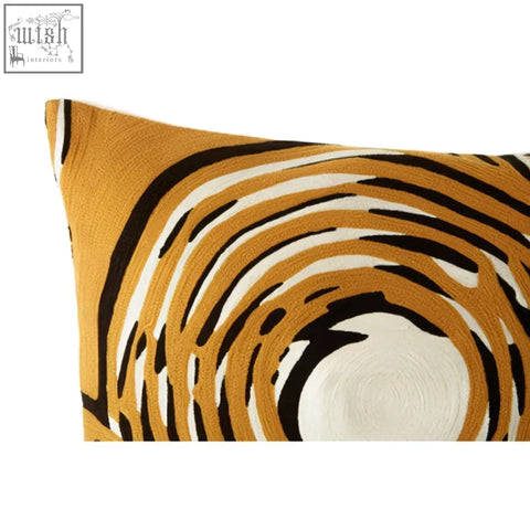Bosie ozella rectangular design embroidered cushion with bold black and white circular design on orange background