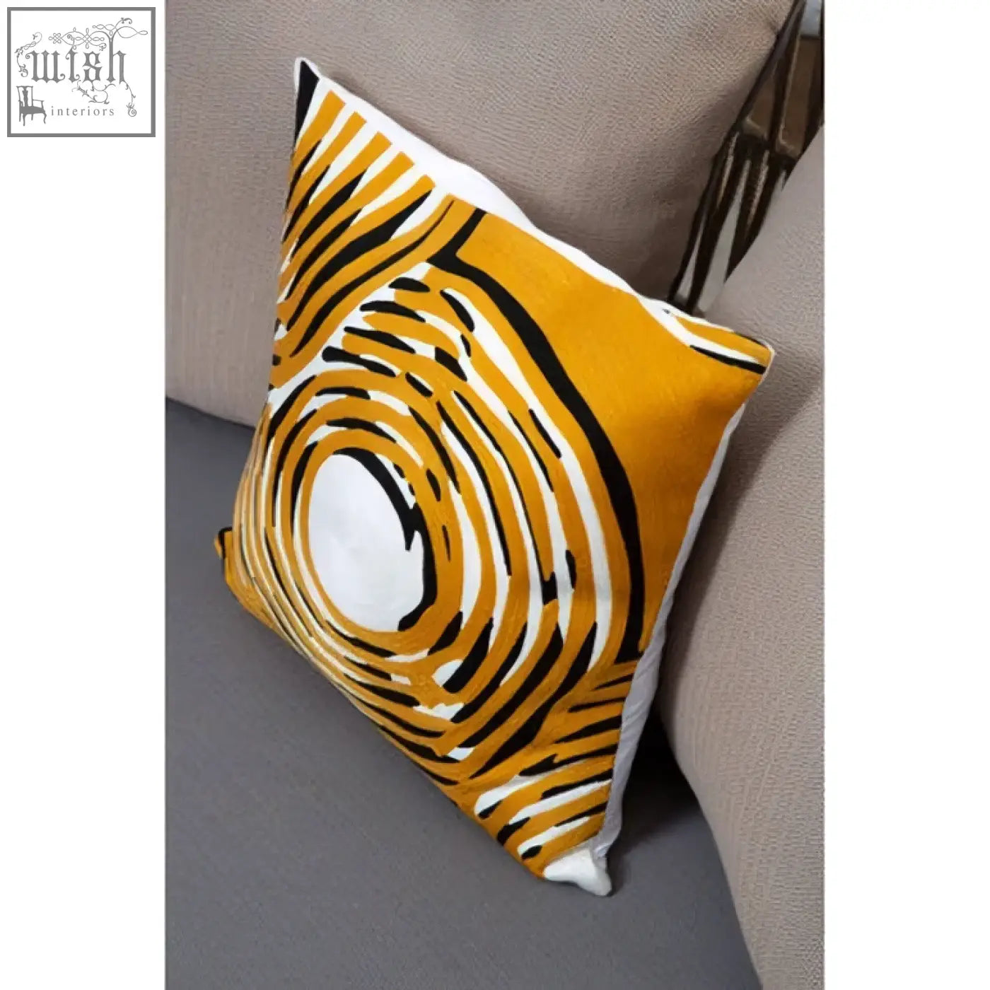 Bosie ozella circular design embroidered cushion with a vibrant yellow background and bold black white circular design