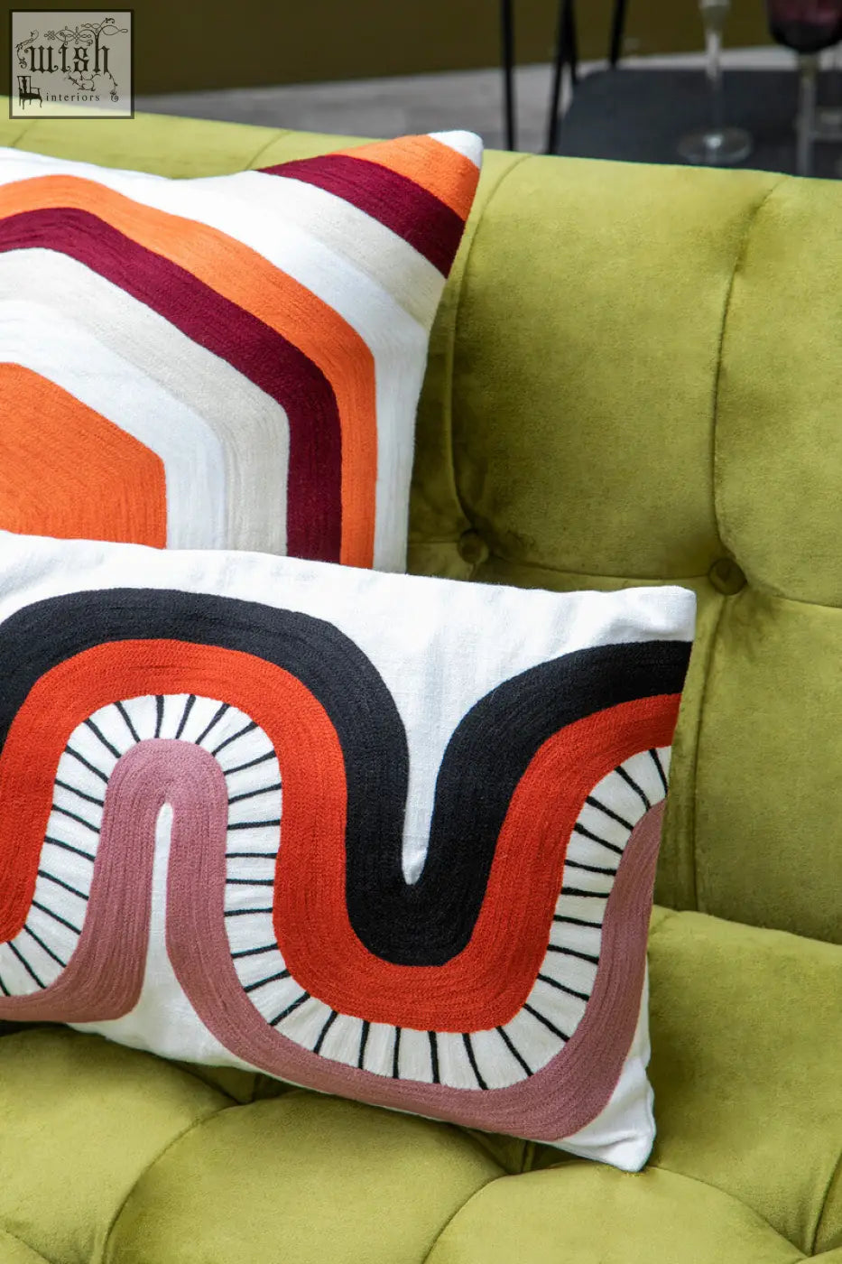 Bosie ozella curve pattern rectangular cushion with bold embroidered wavy stripes in black orange pink and white on soft fabric