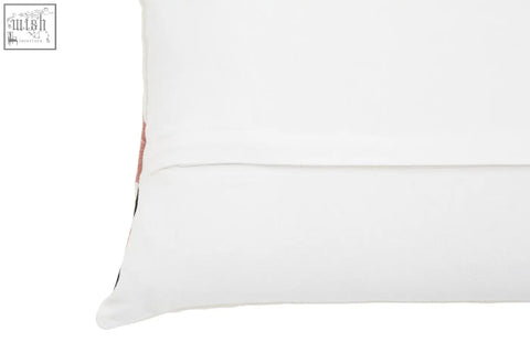 White rectangular Bosie Ozella curve pattern cushion with subtle textured fabric and small embroidered edge detail