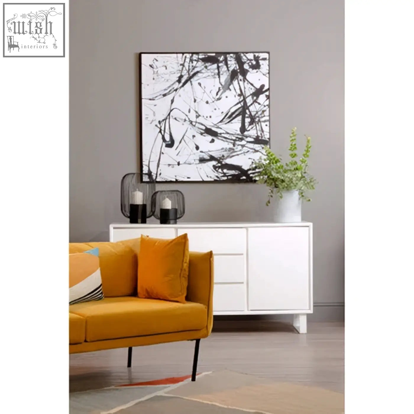 Bosie ozella diagonal design cushion with bold black brushstrokes on white fabric in a sleek black frame design cushion