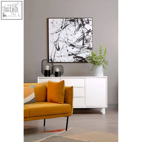 Bosie ozella diagonal design cushion with bold black brushstrokes on white fabric in a sleek black frame design cushion