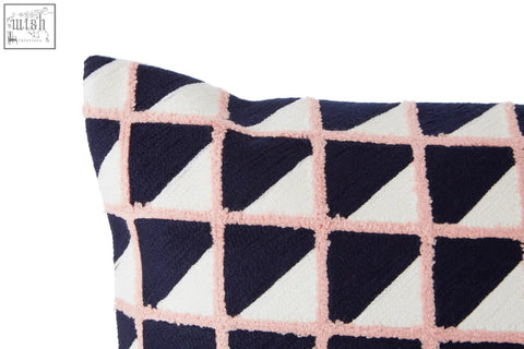 Bosie Ozella grid design cushion with navy cream geometric pattern and textured pink-trimmed grid design cushion