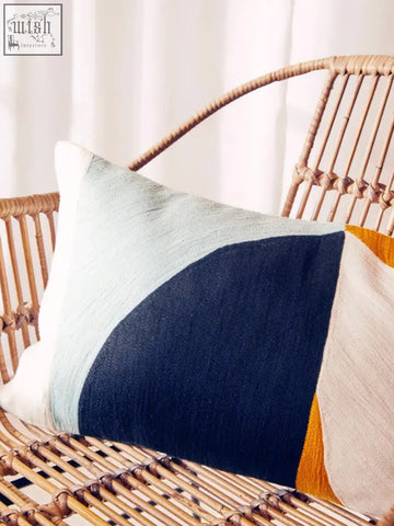 Bosie ozella multi colour rectangular cushion with a modern abstract design in mint navy and mustard yellow tones