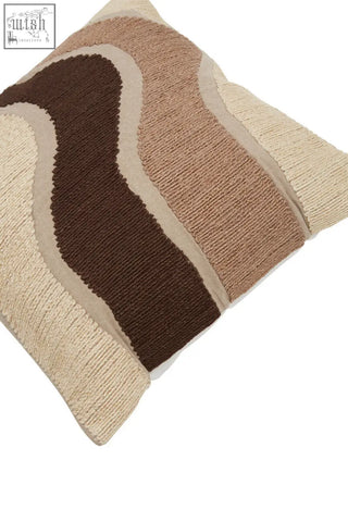 Beige and brown textured natural tonal cushion with wavy layered knit patterns from bosie ozella