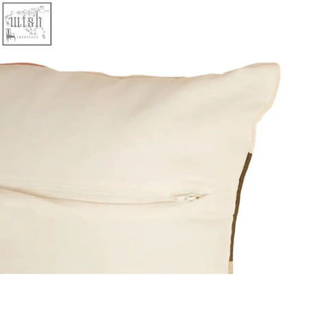 Cream-colored bosie ozella patch design cushion with subtle zipper closure and dark edge stitching