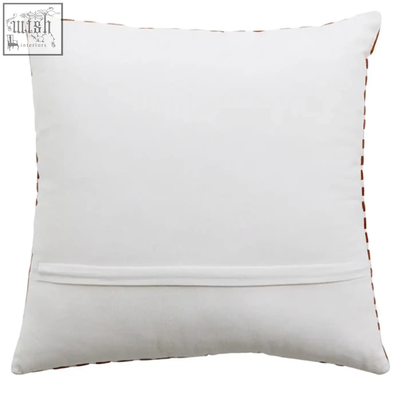 White cushion bosie ozella with subtle brown stitching and intricate embroidery on rust and white fabric