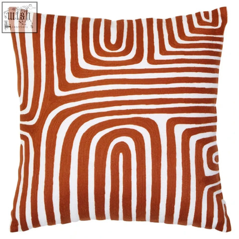 Square throw pillow bosie ozella with bold orange and white geometric pattern made from premium cotton white cushion