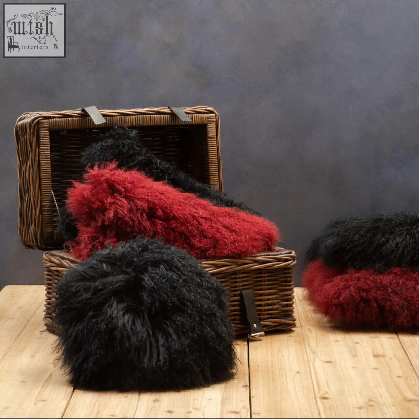 Fluffy black and red sheepskin hats with soft texture shown with bosie real mongolian fur black rectangular cushion