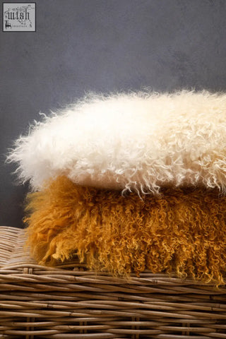 Bosie real mongolian lamb fur rectangular cushion in cream and mustard yellow with soft curly texture