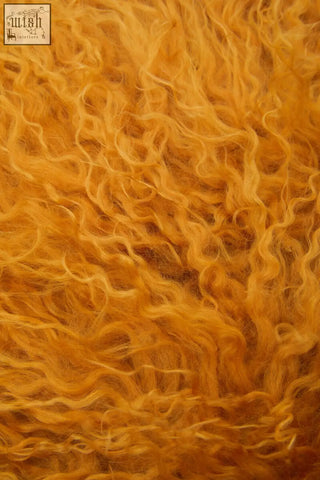 Bosie real mongolian lamb fur ochre cushion with golden-orange curly faux fur plush texture for cozy decor