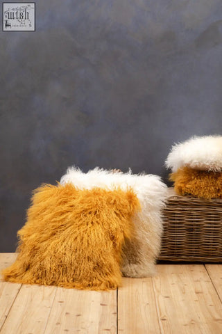 Bosie real mongolian fur ochre square cushion featuring golden-orange fluffy mongolian lamb fur throw pillow texture