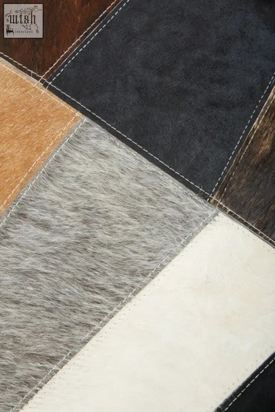 Bosie Safira neutral colourblock hair on leather patchwork cushion with brown black gray white and tan leather patchwork textures