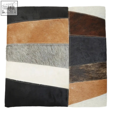 Bosie safira neutral colourblock hair on leather patchwork cushion with black tan gray and white horizontal strips