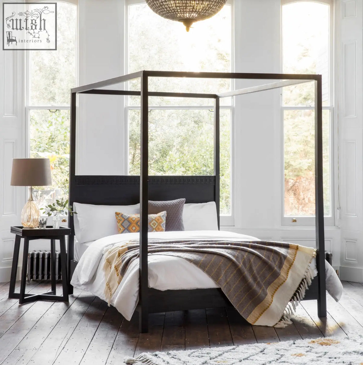 Black super king four poster bed frame with matt black charcoal finish and mixed timber veneers upholstered headboard