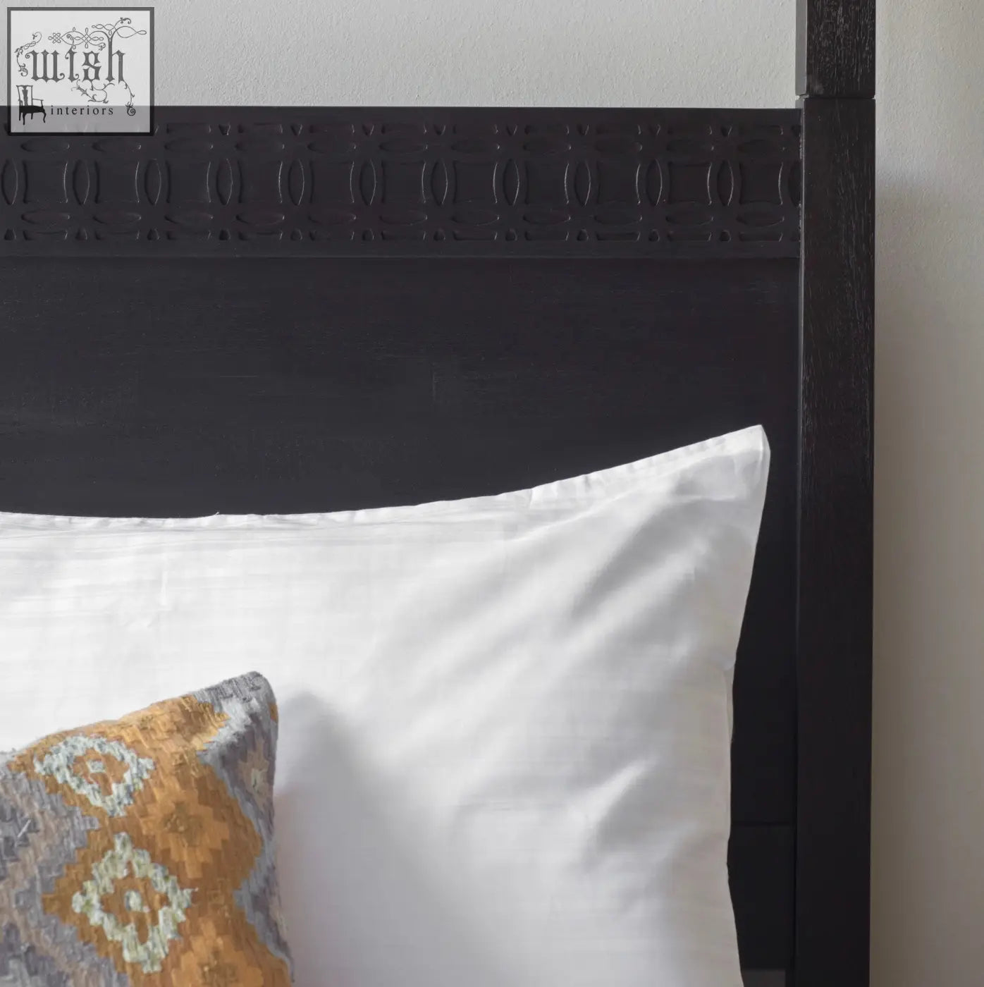 Dark metal headboard with embossed pattern on matt black charcoal bossa super king 4 poster bed frame