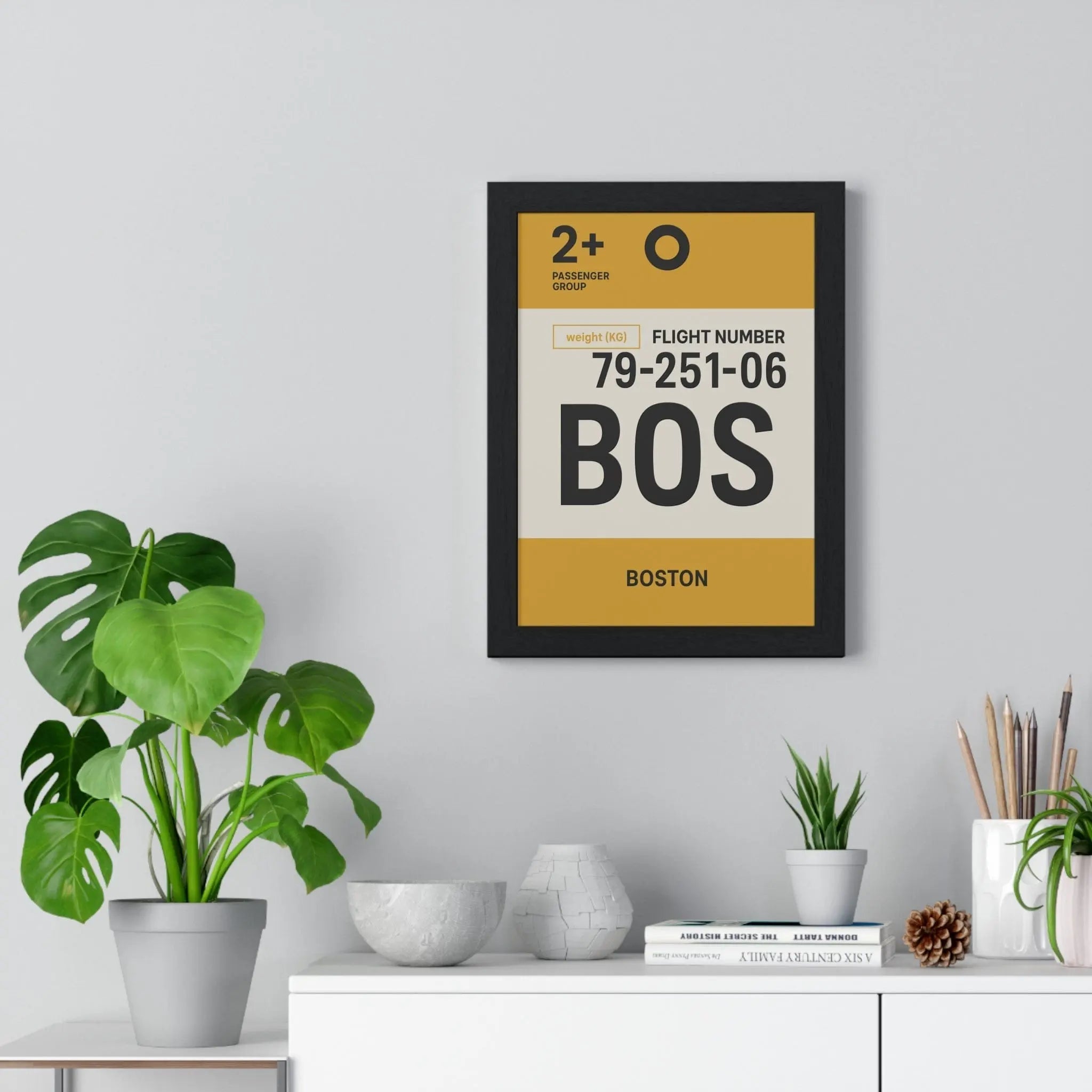 Black-framed boston boarding pass poster with mustard yellow and cream panels showing flight details minimalist travel print