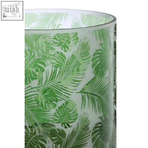 Botanical large hurricane candle holder in translucent green glass with vibrant tropical leaf pattern large hurricane candle