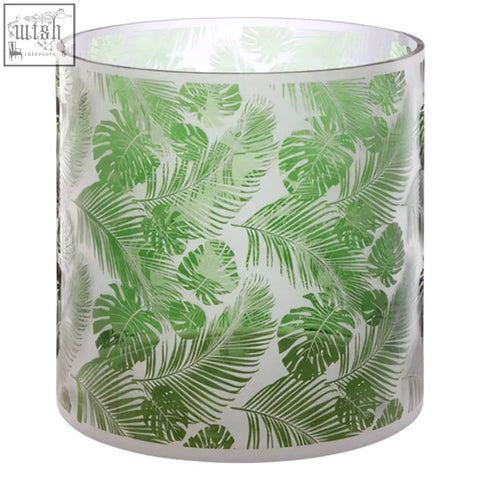 Clear glass large hurricane candle holder with vibrant green tropical leaf pattern perfect for indoor decor