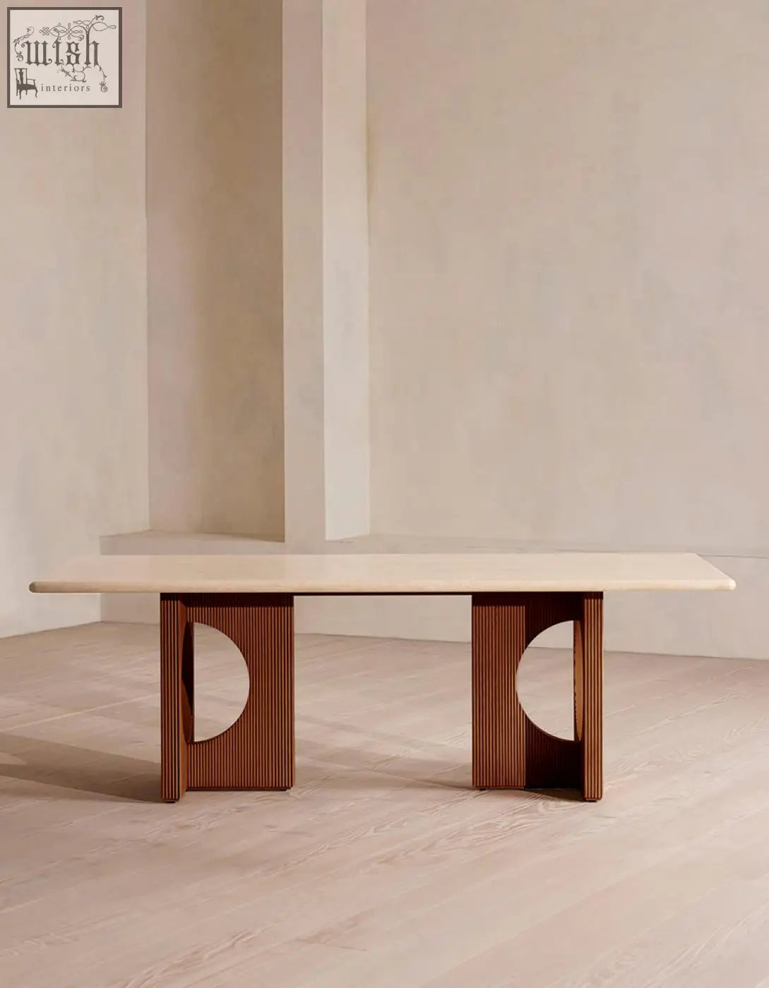 Boucheron dining table with a smooth light travertine top and dark wood grooved legs perfect for your dining area