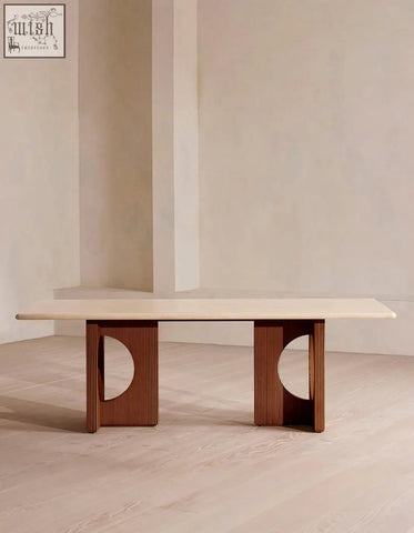 Boucheron dining table with a smooth light travertine top and dark wood grooved legs perfect for your dining area
