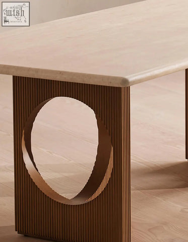 Boucheron dining table with a smooth beige travertine marble top and grooved solid wood base perfect for dining area