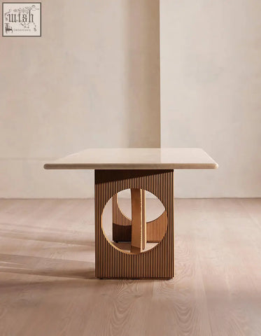 Boucheron dining table with a smooth beige marble dining table top and gold-toned slatted base for modern dining area