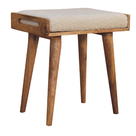 Boucle cream tray style footstool with cozy cream sheepskin cushion and natural wood tapered legs