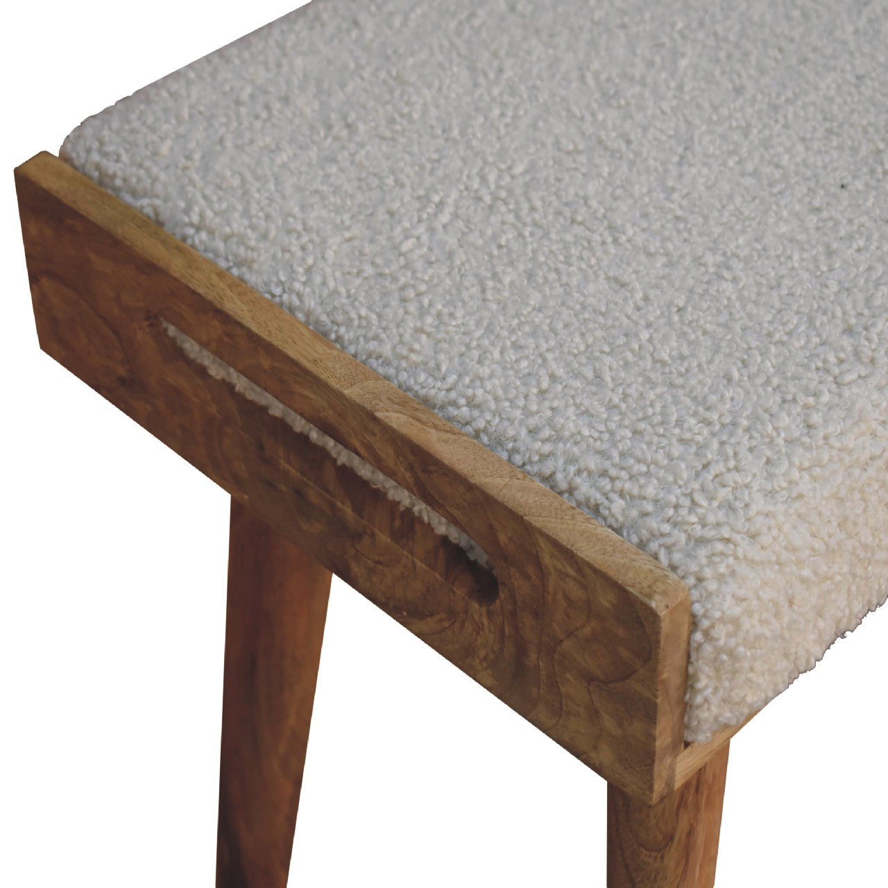 A cozy light gray faux fur cushioned bench with rustic wooden legs in tray style footstool design