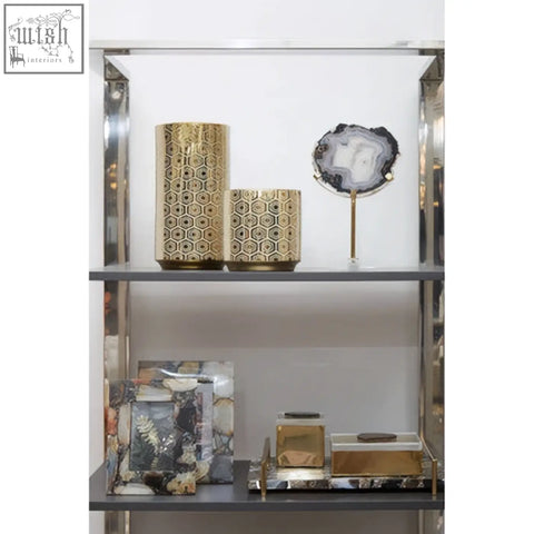Gold geometric patterned cylindrical vases displayed next to the bowerbird black agate small trinket box