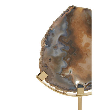 Bowerbird black and gold agate sculpture with polished brown and gray agate slice on gold agate metal stand
