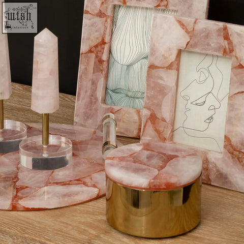 Bowerbird large quartz trinket box is a round gold jewelry box with a pink rose quartz marble lid and large quartz accents