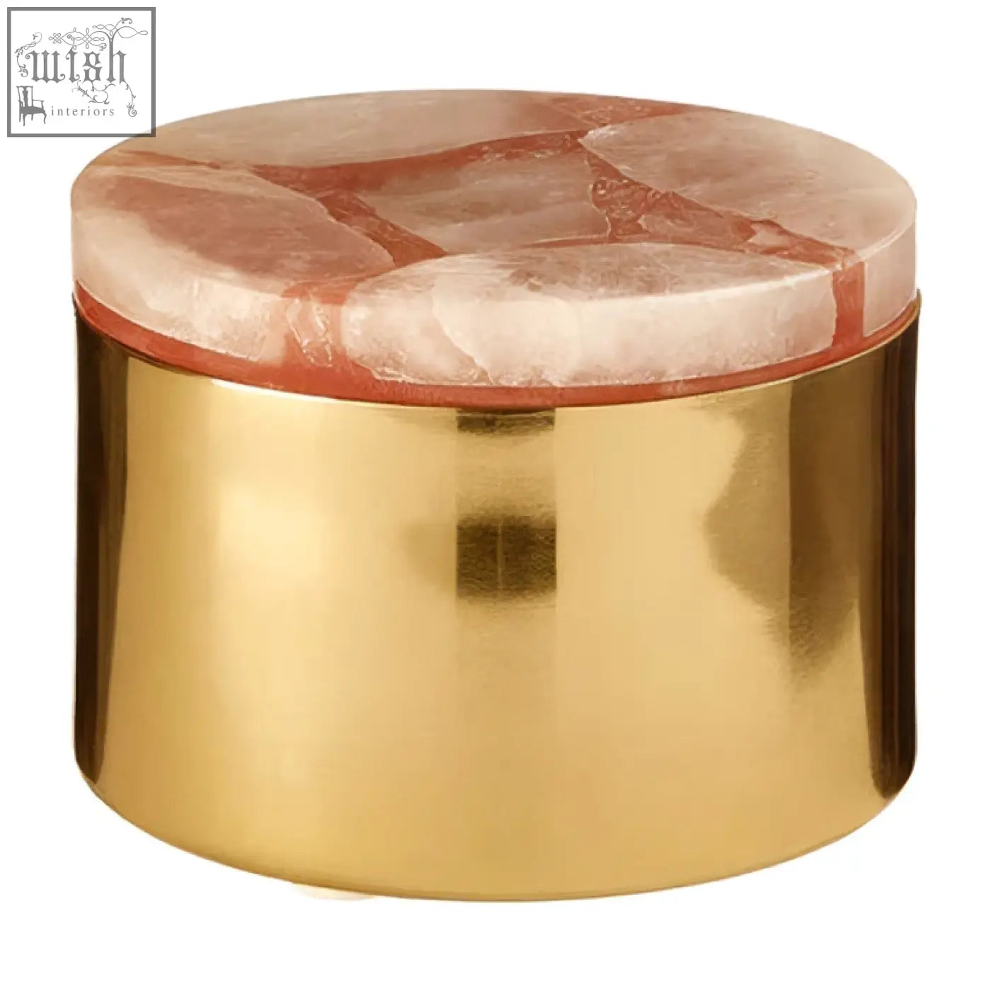A gold-toned cylindrical trinket box with a smooth surface and a pinkish-white quartz lid for small storage