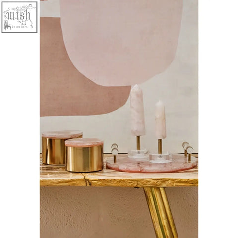 Bowerbird small quartz trinket box with gold-toned candle holders pink marble tops and white candles on gold table