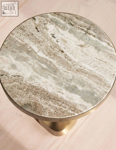 Bozkurt side table with polished marble top in gray and white veining and sleek brass base shipping cost info available